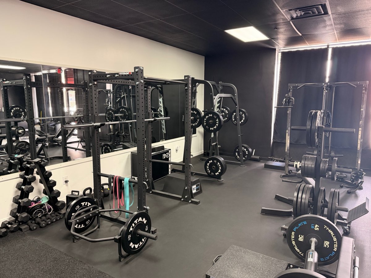 Squat racks and dumbbells